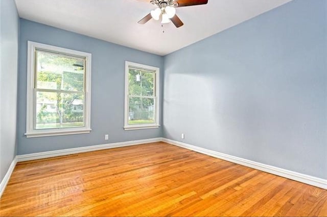 3124 Crest Ridge Dr, Dallas, TX 75228 - unfurnished room featuring baseboards, light wood-style flooring, and ceiling fan
