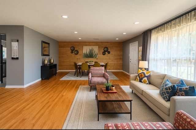 3124 Crest Ridge Dr, Dallas, TX 75228 - living area featuring baseboards, recessed lighting, light wood-style floors, and wooden walls