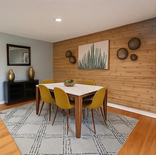 3124 Crest Ridge Dr, Dallas, TX 75228 - dining room featuring wood walls, baseboards, wood finished floors, and recessed lighting