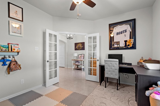 501 Bird Creek Dr, Little Elm, TX 75068 - home office featuring french doors, baseboards, ceiling fan, and light tile patterned flooring