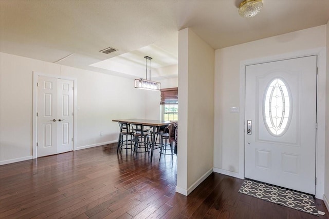 901 Green Branch Rd, Weatherford, TX 76085 - foyer with dark wood-style floors, baseboards, and a chandelier
