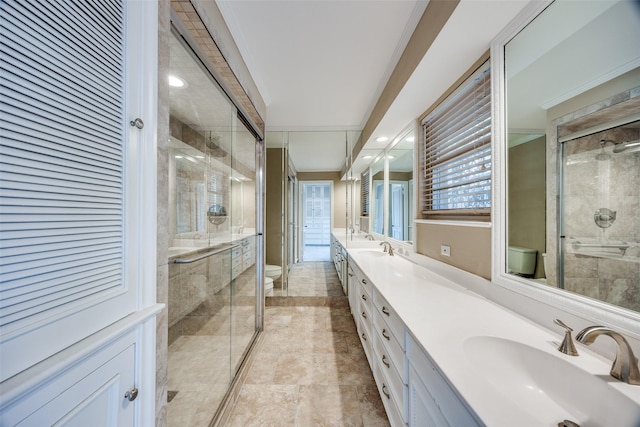 6070 Averill Way Unit A, Dallas, TX 75225 - full bath with toilet, double vanity, and a shower stall