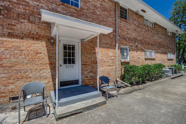 6070 Averill Way Unit A, Dallas, TX 75225 - property entrance with brick siding