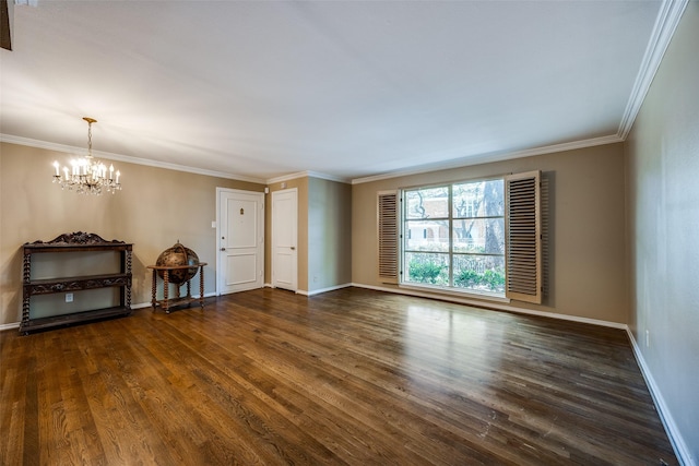 6070 Averill Way Unit A, Dallas, TX 75225 - unfurnished living room featuring a chandelier, dark wood-type flooring, crown molding, and baseboards