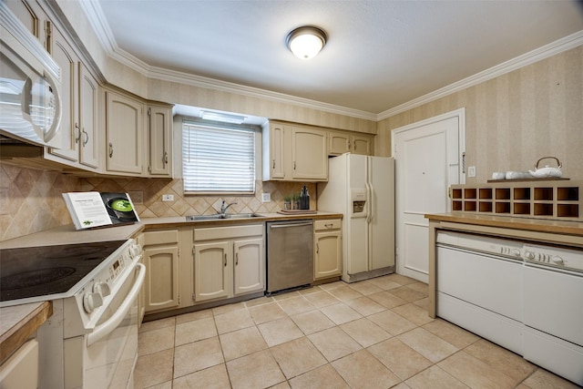6070 Averill Way Unit A, Dallas, TX 75225 - kitchen featuring white appliances, a sink, backsplash, crown molding, and light tile patterned flooring