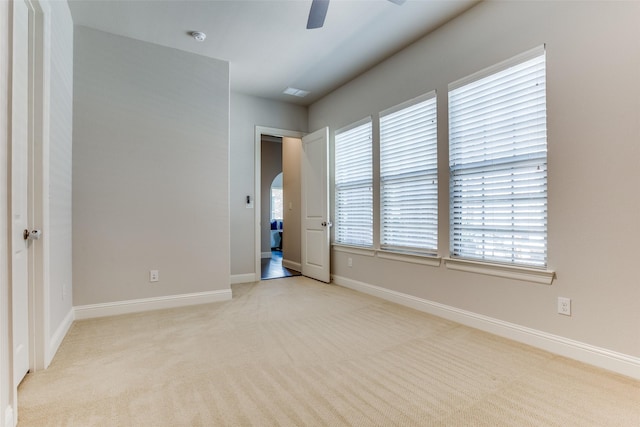 2205 Grafton Ln, Mckinney, TX 75071 - unfurnished room featuring ceiling fan, light carpet, and baseboards