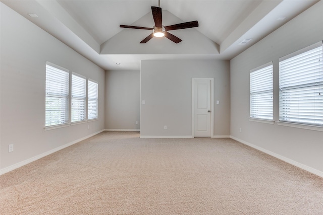 2205 Grafton Ln, Mckinney, TX 75071 - empty room with ceiling fan, vaulted ceiling, light colored carpet, and baseboards