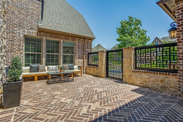 2205 Grafton Ln, Mckinney, TX 75071 - view of patio featuring a gate
