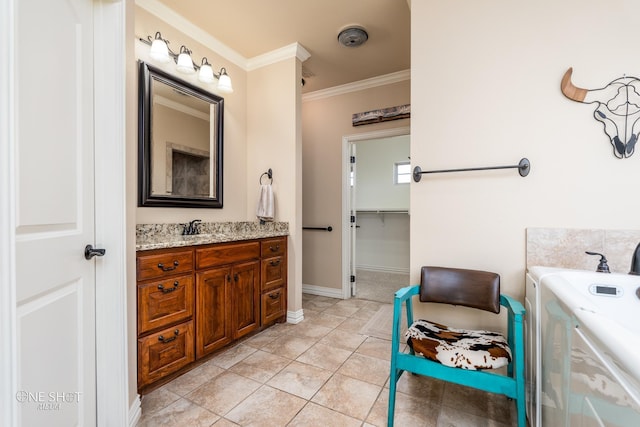 4549 Coyote Run, Abilene, TX 79602 - bathroom featuring crown molding, vanity, tile patterned floors, and baseboards