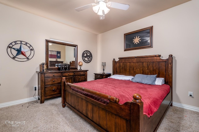 4549 Coyote Run, Abilene, TX 79602 - bedroom with light colored carpet, baseboards, and a ceiling fan