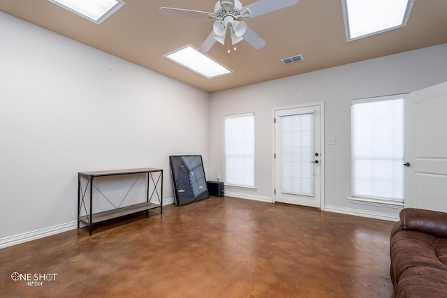 4549 Coyote Run, Abilene, TX 79602 - misc room with concrete floors, ceiling fan, baseboards, and lofted ceiling