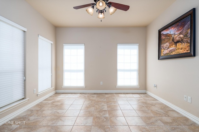 4549 Coyote Run, Abilene, TX 79602 - spare room featuring a ceiling fan, baseboards, and light tile patterned floors