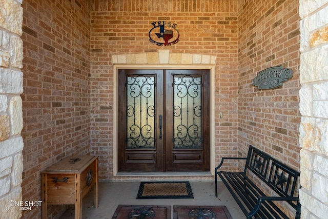 4549 Coyote Run, Abilene, TX 79602 - property entrance featuring french doors and brick siding