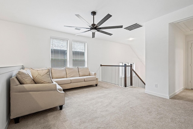 3952 Oak Creek Cir, Denison, TX 75020 - living area featuring attic access, carpet, ceiling fan, and baseboards