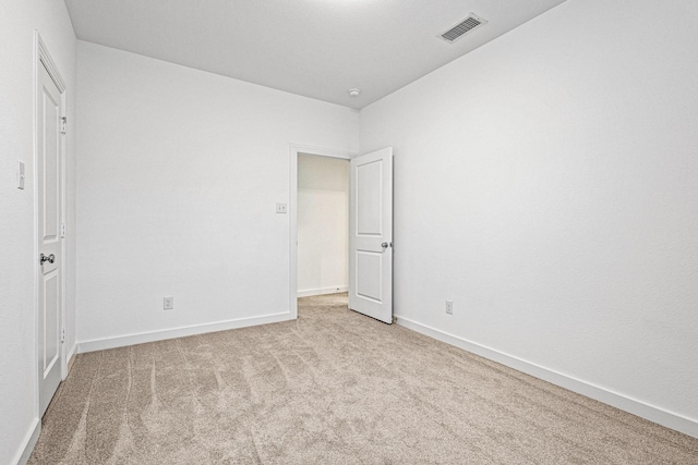 3952 Oak Creek Cir, Denison, TX 75020 - unfurnished bedroom with carpet floors and baseboards