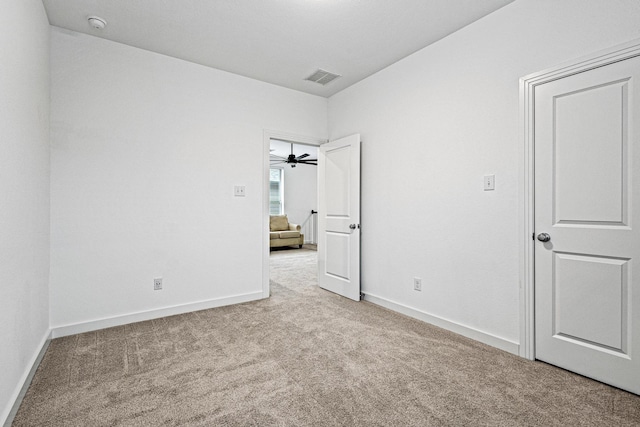 3952 Oak Creek Cir, Denison, TX 75020 - unfurnished bedroom featuring carpet floors and baseboards