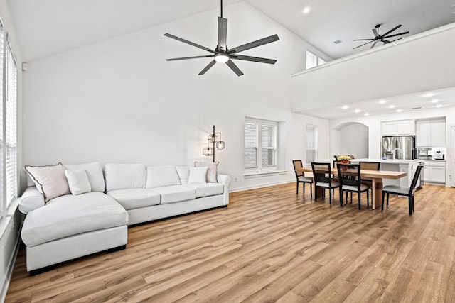 3952 Oak Creek Cir, Denison, TX 75020 - living room featuring a ceiling fan, high vaulted ceiling, light wood-style flooring, and recessed lighting