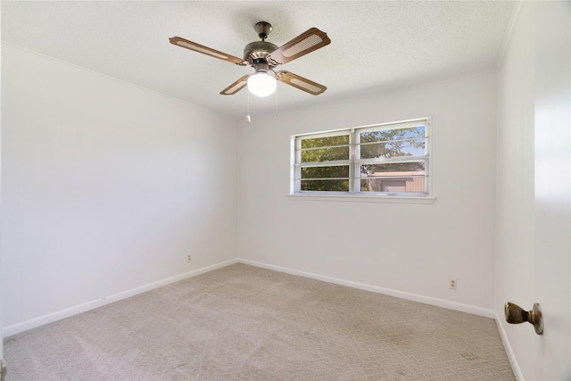 125 Harrison, Detroit, TX 75436 - spare room featuring carpet floors, baseboards, a ceiling fan, and a textured ceiling