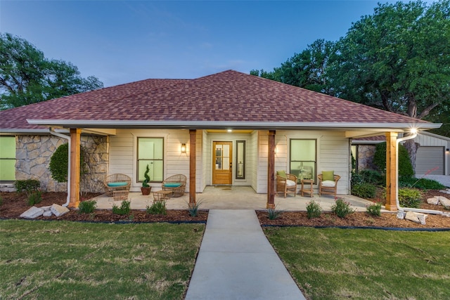 375 Briarwood Ln, Aledo, TX 76008 - view of front of property with covered porch, a shingled roof, a front lawn, and stone siding