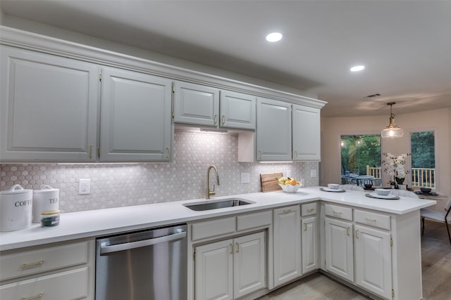 375 Briarwood Ln, Aledo, TX 76008 - kitchen with dishwasher, a sink, a peninsula, decorative backsplash, and light countertops