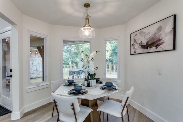 375 Briarwood Ln, Aledo, TX 76008 - dining space with light wood-style flooring and baseboards