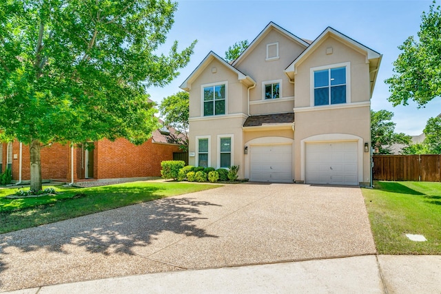 7711 Heather Ridge Ct, Irving, TX 75063 - view of front of house featuring concrete driveway, a garage, and stucco siding