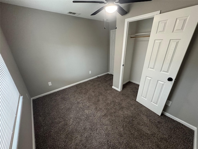 6832 Brierfield Cir, Dallas, TX 75232 - unfurnished bedroom with dark carpet, baseboards, a closet, and a ceiling fan