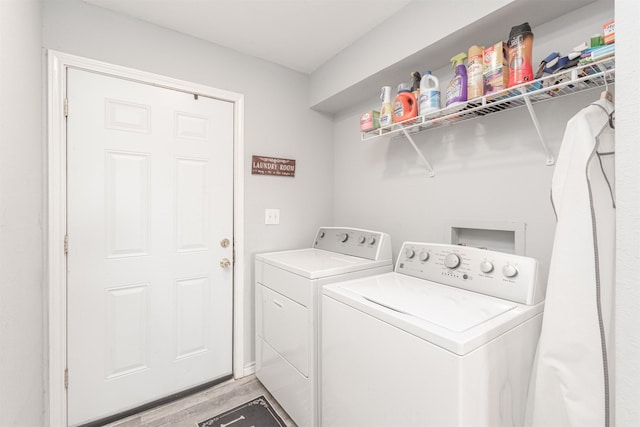 7662 Vz County Road 3504, Wills Point, TX 75169 - clothes washing area featuring washer and dryer and light wood finished floors