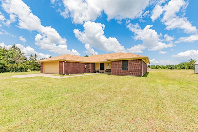 7662 Vz County Road 3504, Wills Point, TX 75169 - single story home with driveway, brick siding, an attached garage, and a front lawn