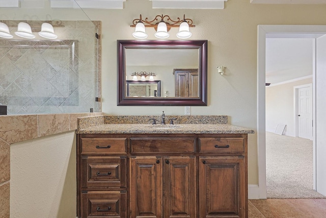 4532 Calmont Ave, Fort Worth, TX 76107 - full bath featuring tiled shower, vanity, crown molding, and tile patterned flooring