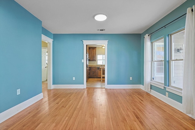 4532 Calmont Ave, Fort Worth, TX 76107 - unfurnished room with light wood finished floors and baseboards