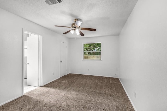 6032 Highcrest Dr, Watauga, TX 76148 - carpeted empty room with ceiling fan, a textured ceiling, and baseboards