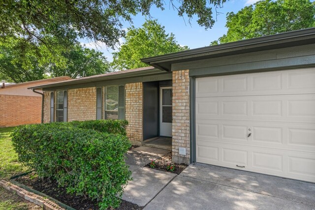 6032 Highcrest Dr, Watauga, TX 76148 - ranch-style home with brick siding, driveway, and an attached garage