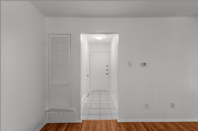 6032 Highcrest Dr, Watauga, TX 76148 - hallway featuring wood finished floors, ornamental molding, and baseboards