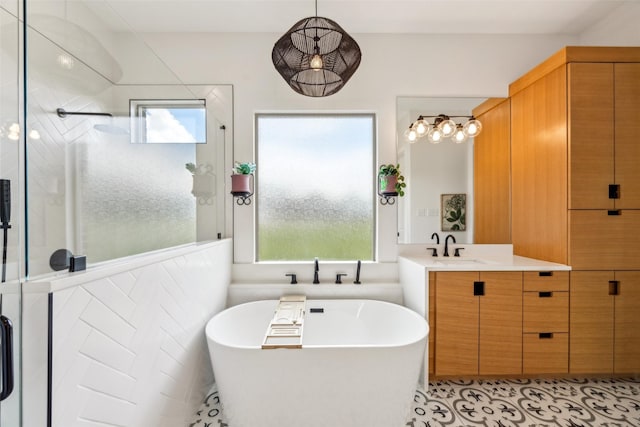 5900 Stage Coach Cir, Westlake, TX 76262 - bathroom with a shower with door, a freestanding bath, and vanity