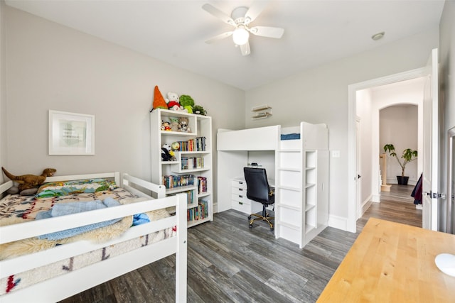 5900 Stage Coach Cir, Westlake, TX 76262 - bedroom featuring dark wood-style floors, arched walkways, baseboards, an office area, and ceiling fan