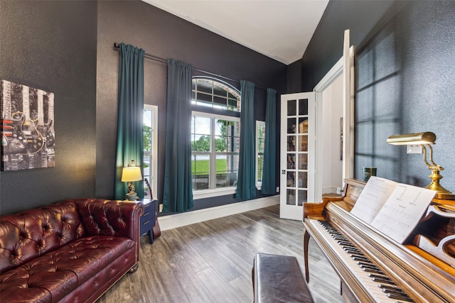 5900 Stage Coach Cir, Westlake, TX 76262 - living area featuring wood finished floors, a textured wall, baseboards, and french doors