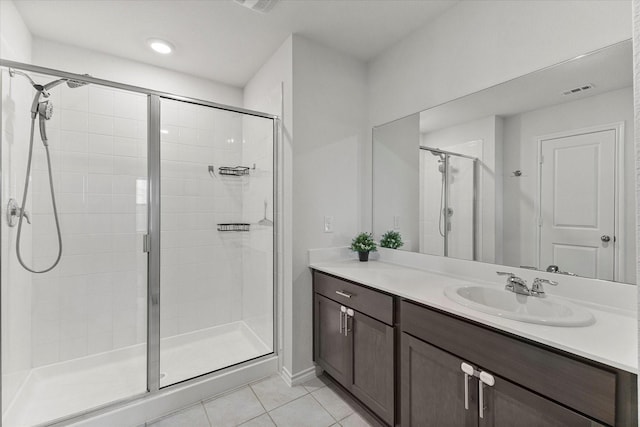 3303 Hawkins Dr, Fate, TX 75189 - full bath with tile patterned flooring, a stall shower, and vanity