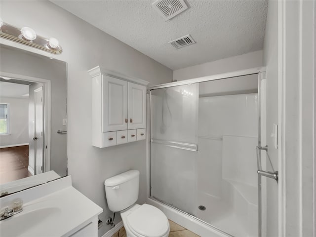 1301 Archdale Ct, Fort Worth, TX 76028 - full bath with a shower stall, toilet, a textured ceiling, and vanity