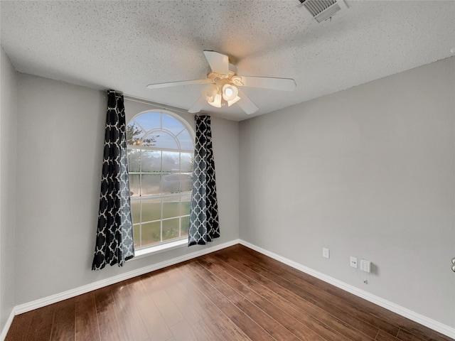1301 Archdale Ct, Fort Worth, TX 76028 - unfurnished room featuring ceiling fan, a textured ceiling, baseboards, and wood finished floors