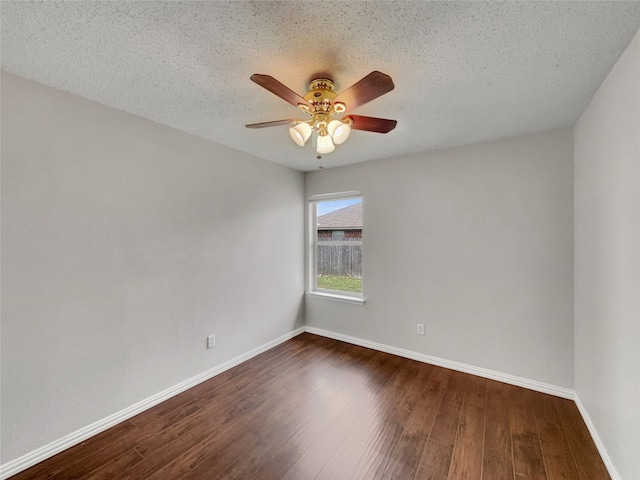 1301 Archdale Ct, Fort Worth, TX 76028 - spare room featuring ceiling fan, dark wood-type flooring, baseboards, and a textured ceiling