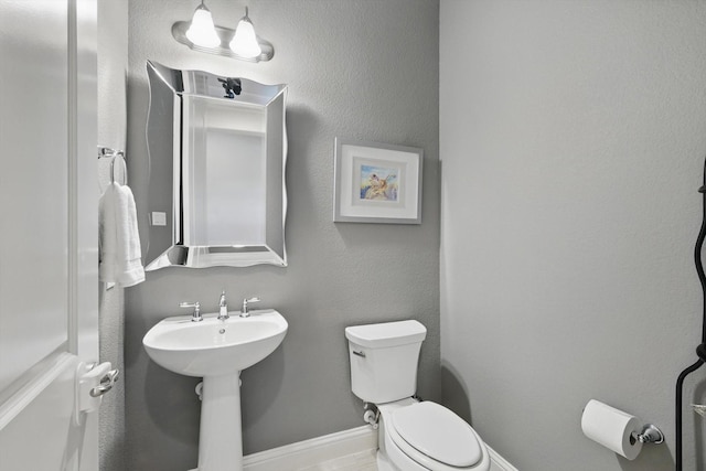 7401 Sabine Dr, Mckinney, TX 75071 - bathroom with toilet and a sink