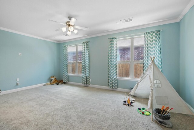 7401 Sabine Dr, Mckinney, TX 75071 - playroom featuring crown molding, ceiling fan, baseboards, and carpet floors