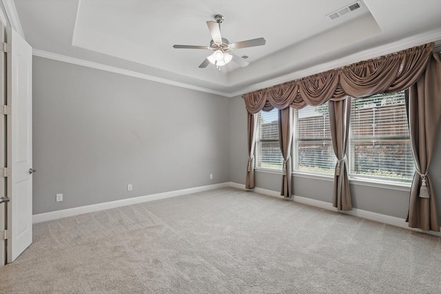 7401 Sabine Dr, Mckinney, TX 75071 - carpeted empty room with a tray ceiling, a ceiling fan, baseboards, and crown molding