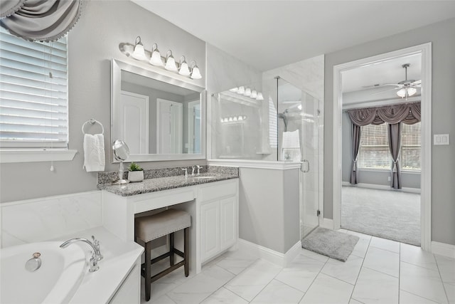 7401 Sabine Dr, Mckinney, TX 75071 - full bath with a stall shower, vanity, a garden tub, ceiling fan, and baseboards