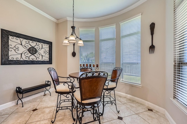 600 Oakmont Ct, Desoto, TX 75115 - dining area featuring ornamental molding, healthy amount of natural light, light tile patterned floors, and baseboards