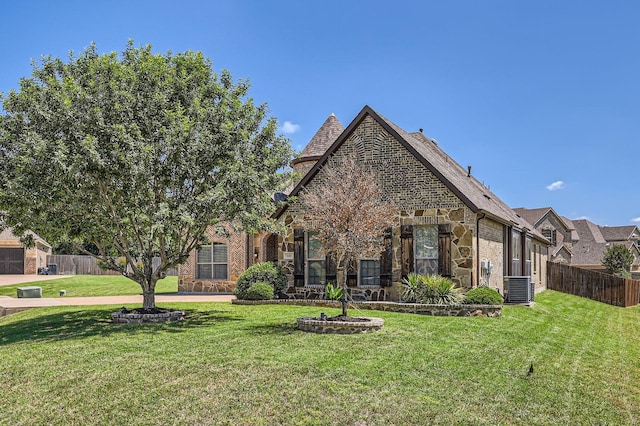 600 Oakmont Ct, Desoto, TX 75115 - view of front of home featuring stone siding, brick siding, and central AC unit