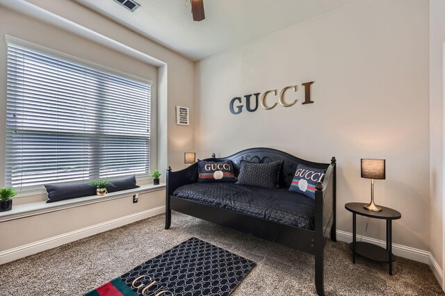600 Oakmont Ct, Desoto, TX 75115 - carpeted bedroom with baseboards and a ceiling fan