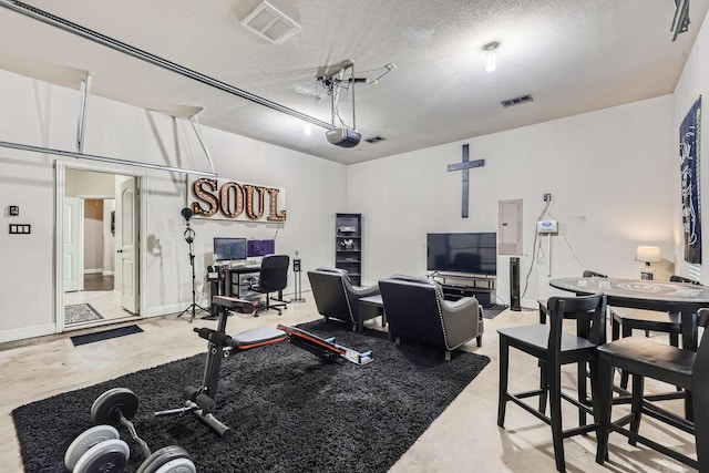 600 Oakmont Ct, Desoto, TX 75115 - workout room featuring a textured ceiling