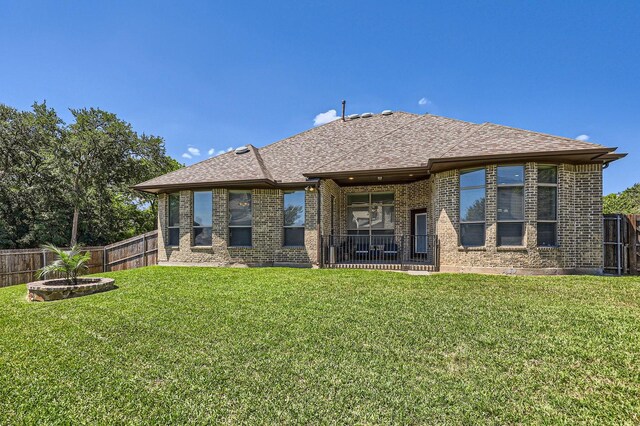 600 Oakmont Ct, Desoto, TX 75115 - rear view of property featuring brick siding and roof with shingles